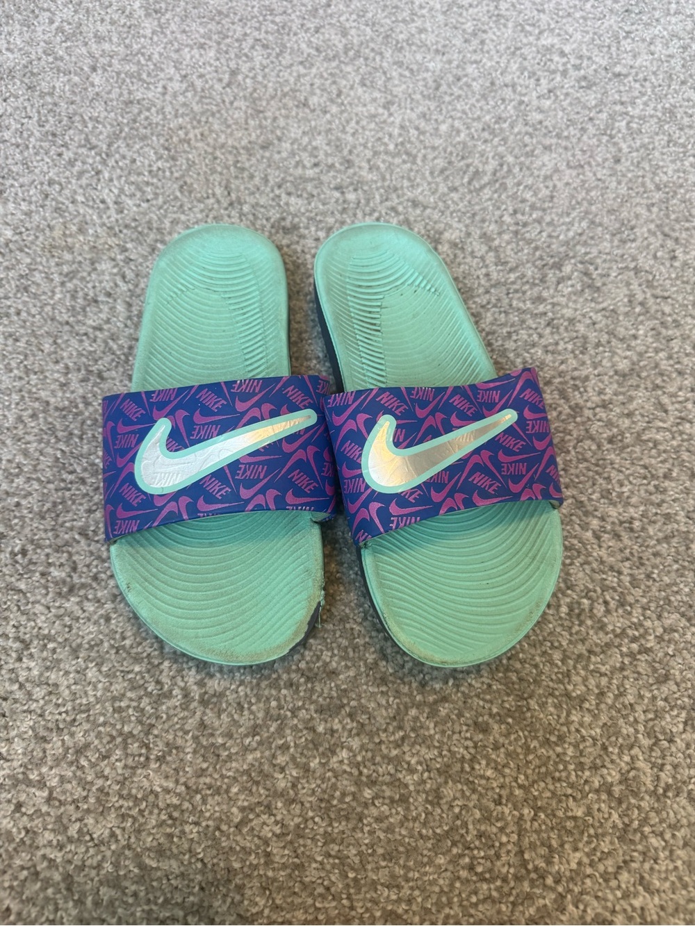 Nike Teal Slide Sandals with Purple Accent